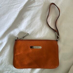 Michael Kors Orange Wristlet Never Used